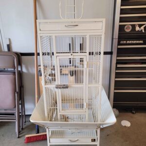 White parrot cage with rolling base and elevated play area